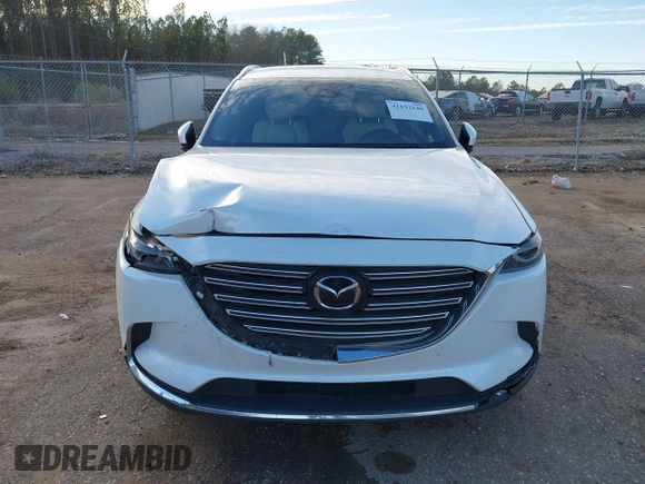 2016 Mazda CX-9 Grand Touring z VIN JM3TCADY4G0124588, wystawiony jako IAAI lot #41192549 z przebiegiem 161 272 mil mil oraz . Historia ofert i sprzedaży dostępna na DreamBid. Obrazek 12.