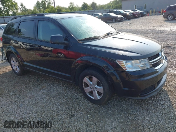 2013 Dodge Journey SE with VIN 3C4PDCAB9DT561701, listed as a IAAI auction lot 42403322 with 143,766 mi miles and . Bid and sale history available at DreamBid. Image 1.