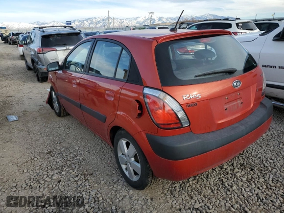 2009 Kia Rio LX with VIN KNADE243X96587429, listed as a Copart auction lot 46500825 with 116,557 mi miles and Salvage Title. Bid and sale history available at carsss.com. Image 2.