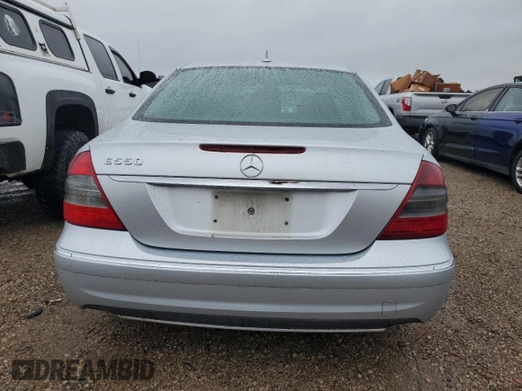 2007 Mercedes-Benz E 550 with VIN WDBUF72X77B059322, listed as a Copart auction lot 72271754 with 149,204 mi miles and Salvage Title. Bid and sale history available at DreamBid. Image 6.