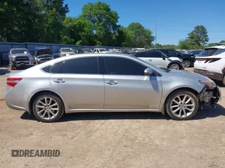 2013 Toyota Avalon XLE with VIN 4T1BK1EB9DU004853, listed as a IAAI auction lot 42018406 with 139,566 mi miles and . Bid and sale history available at DreamBid. Image 18.