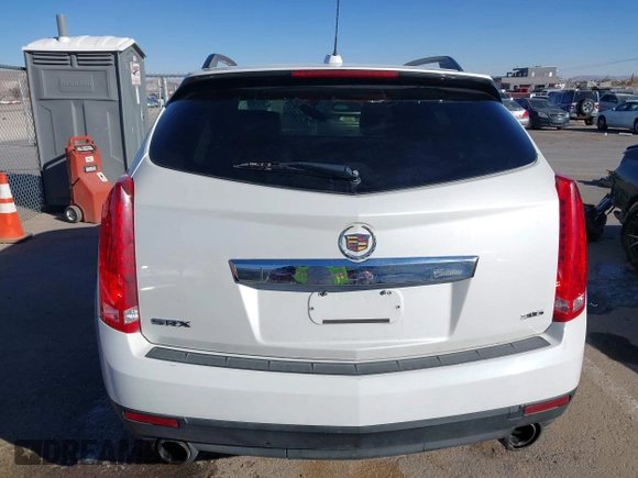 2015 Cadillac SRX with VIN 3GYFNAE34FS557297, listed as a IAAI auction lot 41388573 with 124,185 mi miles and . Bid and sale history available at DreamBid. Image 16.