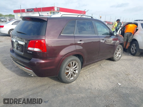 2011 Kia Sorento SX with VIN 5XYKW4A28BG127753, listed as a IAAI auction lot 42033754 with 163,470 mi miles. Bid and sale history available at carsss.com. Image 4.