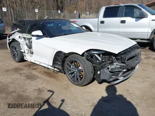 2020 BMW Z4 sDrive30i z VIN WBAHF3C09LWW54993, wystawiony jako IAAI lot #41757841 z przebiegiem Nie podano mil oraz . Historia ofert i sprzedaży dostępna na DreamBid. Obrazek 6.