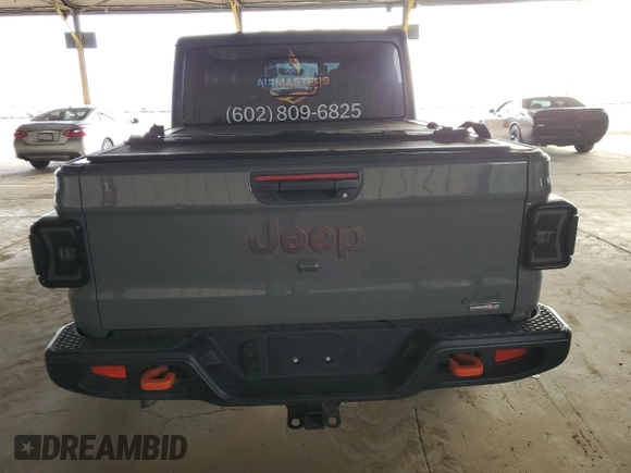 2020 Jeep Gladiator Mojave with VIN 1C6JJTEG1LL202459, listed as a Copart auction lot 79334434 with 49,515 mi miles and Salvage title. Bid and sale history available at DreamBid. Image 6.