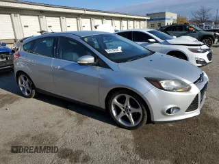 2014 Ford Focus Titanium z VIN 1FADP3N2XEL263357, wystawiony jako Copart lot #84610634 z przebiegiem 142 023 mil mil oraz Nie do naprawy • Non repairable. Historia ofert i sprzedaży dostępna na DreamBid. Obrazek 4.