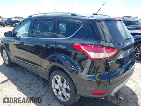 2015 Ford Escape Titanium with VIN 1FMCU0JX3FUB39808, listed as a IAAI auction lot 42212271 with 136,488 mi miles and . Bid and sale history available at DreamBid. Image 3.