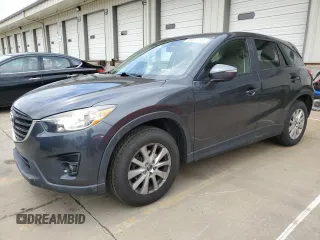 2016 Mazda CX-5 Touring z VIN JM3KE2CY9G0603473, wystawiony jako Copart lot #56831145 z przebiegiem 110 531 mil mil oraz Szkody całkowita. Historia ofert i sprzedaży dostępna na DreamBid. Obrazek 1.