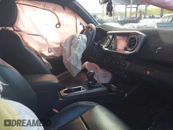 2018 Toyota Tacoma SR z VIN 3TMCZ5AN7JM156092, wystawiony jako IAAI lot #41642391 z przebiegiem 65 805 mil mil oraz . Historia ofert i sprzedaży dostępna na DreamBid. Obrazek 5.