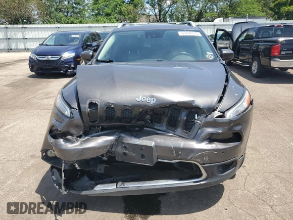 2014 Jeep Cherokee Limited with VIN 1C4PJMDS4EW211057, listed as a Copart auction lot 63448375 with Not provided miles and Salvage title. Bid and sale history available at DreamBid. Image 5.