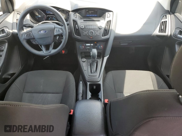2017 Ford Focus SE with VIN 1FADP3FE7HL290271, listed as a Copart auction lot 60665615 with 130,409 mi miles and Salvage title. Bid and sale history available at DreamBid. Image 8.