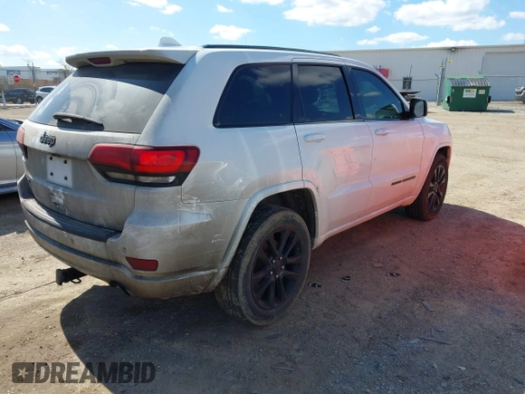 2017 Jeep Grand Cherokee Laredo with VIN 1C4RJFAG9HC824883, listed as a IAAI auction lot 41876117 with 141,067 mi miles. Bid and sale history available at carsss.com. Image 4.