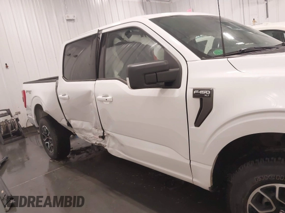 2023 Ford F-150 XL z VIN 1FTFW1E85PFA54558, wystawiony jako IAAI lot #42215749 z przebiegiem 22 476 mil mil oraz . Historia ofert i sprzedaży dostępna na DreamBid. Obrazek 6.