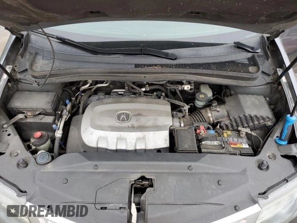 2012 Acura MDX z VIN 2HNYD2H24CH550515, wystawiony jako Copart lot #56921005 z przebiegiem 159 650 mil mil oraz Szkoda całkowita • Salvage title. Historia ofert i sprzedaży dostępna na DreamBid. Obrazek 12.