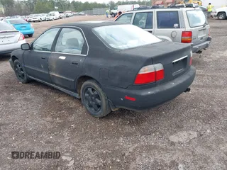 1997 Honda Accord LX with VIN 1HGCD563XVA027015, listed as a IAAI auction lot 41740173 with 461,837 mi miles and . Bid and sale history available at carsss.com. Image 3.
