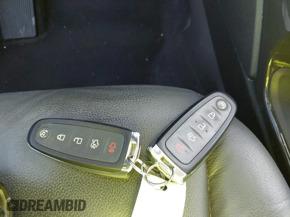 2016 Ford Escape Titanium with VIN 1FMCU0J94GUB11776, listed as a IAAI auction lot 41945655 with 119,949 mi miles. Bid and sale history available at carsss.com. Image 11.