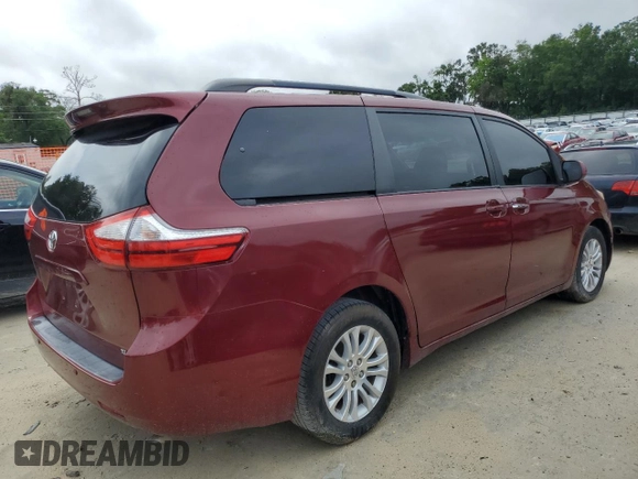 2015 Toyota Sienna XLE with VIN 5TDYK3DC4FS643881, listed as a Copart auction lot 56684635 with 137,781 mi miles and Salvage Title. Bid and sale history available at DreamBid. Image 3.