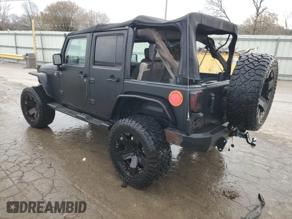 2007 Jeep Wrangler Unlimited X with VIN 1J4GA391X7L171902, listed as a Copart auction lot 82150334 with 167,695 mi miles and Salvage title. Bid and sale history available at DreamBid. Image 2.
