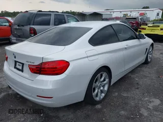 2015 BMW 4 Series 428i with VIN WBA3N3C54FK233803, listed as a IAAI auction lot 40481486 with 74,556 mi miles and . Bid and sale history available at DreamBid. Image 4.