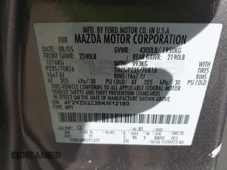 2006 Mazda Tribute i with VIN 4F2YZ02Z26KM12180, listed as a IAAI auction lot 41959606 with 228,217 mi miles and . Bid and sale history available at DreamBid. Image 9.