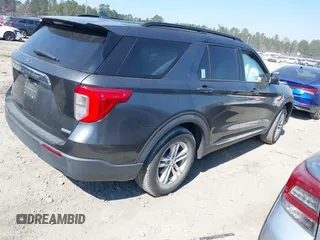 2020 Ford Explorer XLT with VIN 1FMSK7DH0LGB14180, listed as a IAAI auction lot 41671804 with 76,677 mi miles. Bid and sale history available at carsss.com. Image 4.