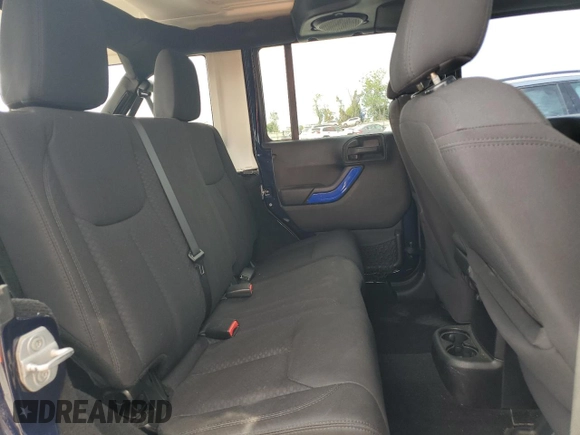 2013 Jeep Wrangler Unlimited Sport z VIN 1C4BJWDG7DL509796, wystawiony jako Copart lot #55787455 z przebiegiem 178 907 mil mil oraz Nie do naprawy • Non repairable. Historia ofert i sprzedaży dostępna na DreamBid. Obrazek 11.