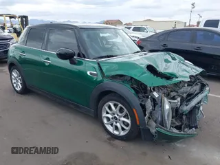 2020 MINI Hardtop 4 Door Cooper with VIN WMWXU7C08L2M11014, listed as a IAAI auction lot 41798892 with 83,728 mi miles and . Bid and sale history available at DreamBid. Image 1.