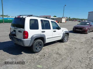 2003 Jeep Liberty Sport with VIN 1J4GK48K63W558064, listed as a IAAI auction lot 42043911 with 171,317 mi miles and . Bid and sale history available at DreamBid. Image 4.