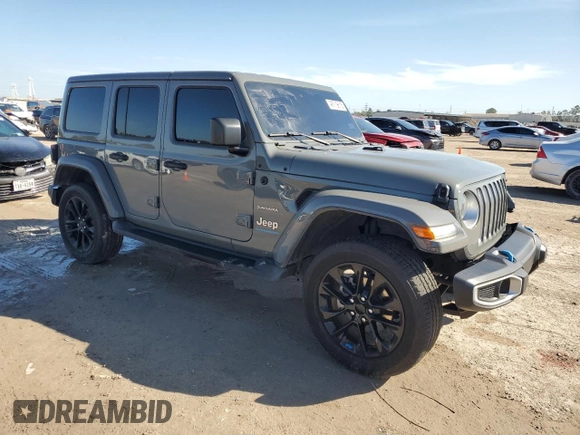 2023 Jeep Wrangler Sahara with VIN 1C4JJXP61PW505122, listed as a Copart auction lot 46719615 with 28,691 mi miles and Salvage Title. Bid and sale history available at DreamBid. Image 4.