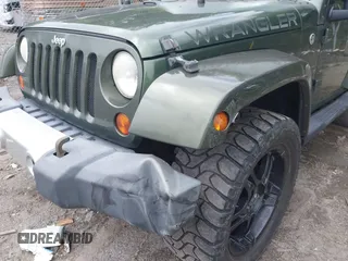 2008 Jeep Wrangler Sahara with VIN 1J4FA54178L647426, listed as a IAAI auction lot 42496322 with 157,016 mi miles and . Bid and sale history available at DreamBid. Image 6.