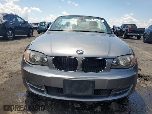 2011 BMW 1 Series 128i with VIN WBAUN1C52BVH82744, listed as a Copart auction lot 63441125 with 129,245 mi miles and Salvage title. Bid and sale history available at DreamBid. Image 5.