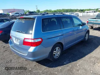 2007 Honda Odyssey EX-L with VIN 5FNRL38707B051950, listed as a IAAI auction lot 42175286 with 125,818 mi miles. Bid and sale history available at carsss.com. Image 4.