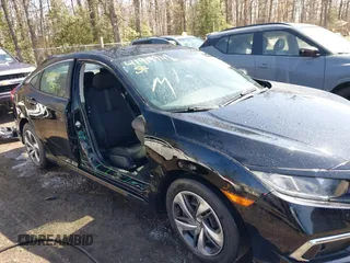 2020 Honda Civic LX with VIN 2HGFC2F69LH532499, listed as a IAAI auction lot 41919941 with 96,936 mi miles and . Bid and sale history available at DreamBid. Image 6.