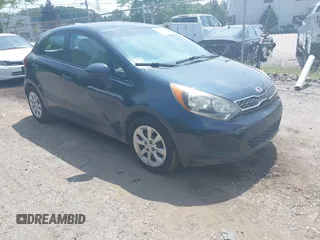 2012 Kia Rio EX with VIN KNADN5A33C6060071, listed as a IAAI auction lot 39835704 with 98,271 mi miles. Bid and sale history available at carsss.com. Image 1.