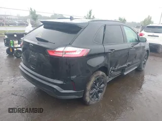 2022 Ford Edge SE z VIN 2FMPK4G94NBA99279, wystawiony jako IAAI lot #42351490 z przebiegiem 30 044 mil mil oraz . Historia ofert i sprzedaży dostępna na DreamBid. Obrazek 4.