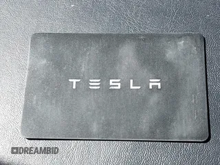2019 Tesla Model 3 Mid Range with VIN 5YJ3E1EA1KF422983, listed as a IAAI auction lot 41861334 with 53,017 mi miles. Bid and sale history available at carsss.com. Image 11.