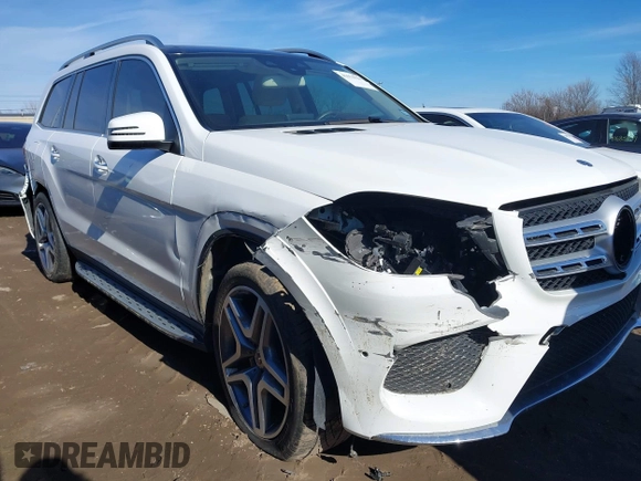 2018 Mercedes-Benz GLS 550 with VIN 4JGDF7DE8JB029455, listed as a IAAI auction lot 41674129 with 67,209 mi miles and . Bid and sale history available at DreamBid. Image 6.