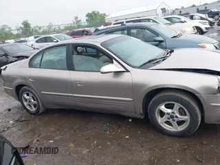 2001 Pontiac Bonneville SE z VIN 1G2HX54K814258899, wystawiony jako IAAI lot #42260783 z przebiegiem 165 869 mil mil oraz . Historia ofert i sprzedaży dostępna na DreamBid. Obrazek 13.