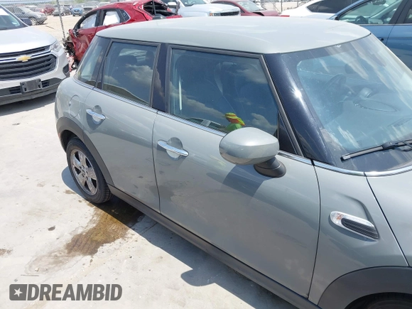 2021 MINI Hardtop 4 Door Oxford Edition with VIN WMWXU7C09M2P17351, listed as a IAAI auction lot 42330197 with 51,628 mi miles and . Bid and sale history available at DreamBid. Image 13.