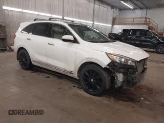 2016 Kia Sorento SX z VIN 5XYPKDA5XGG093835, wystawiony jako IAAI lot #41655763 z przebiegiem 136 874 mil mil oraz . Historia ofert i sprzedaży dostępna na DreamBid. Obrazek 1.