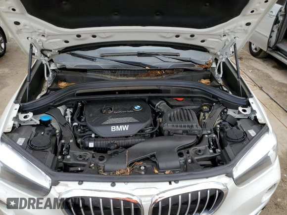 2019 BMW X1 sDrive28i with VIN WBXHU7C57K5L10243, listed as a Copart auction lot 48959423 with 42,248 mi miles and . Bid and sale history available at DreamBid. Image 12.
