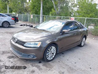 2012 Volkswagen Jetta Sedan SEL w/Sunroof with VIN 3VWLX7AJ9CM409833, listed as a IAAI auction lot 42008181 with 185,803 mi miles. Bid and sale history available at carsss.com. Image 2.