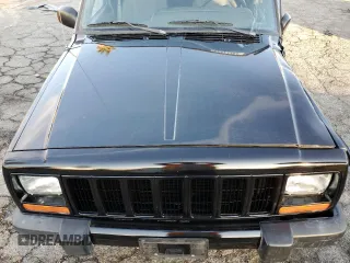 2001 Jeep Cherokee Sport with VIN 1J4FT48S51L568981, listed as a Copart auction lot 82471104 with 181,870 mi miles and Salvage Title. Bid and sale history available at carsss.com. Image 13.