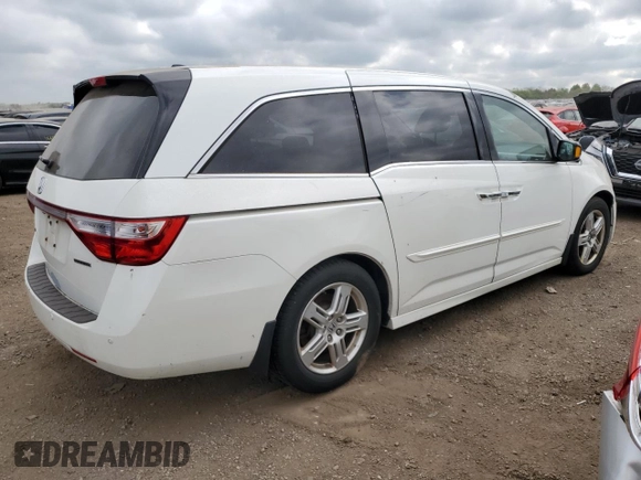 2012 Honda Odyssey Touring with VIN 5FNRL5H92CB047020, listed as a Copart auction lot 56539795 with 155,788 mi miles and Clean Title. Bid and sale history available at DreamBid. Image 3.