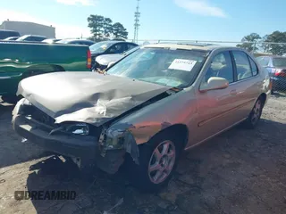 1998 Nissan Altima XE with VIN 1N4DL01D9WC223547, listed as a IAAI auction lot 41275743 with 178,699 mi miles. Bid and sale history available at carsss.com. Image 2.