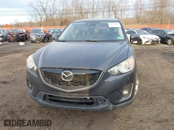 2015 Mazda CX-5 Grand Touring with VIN JM3KE4DY5F0470445, listed as a IAAI auction lot 41236468 with 87,845 mi miles. Bid and sale history available at carsss.com. Image 6.