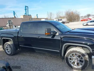 2015 GMC Sierra 1500 SLT with VIN 3GTU2VEJ1FG395885, listed as a IAAI auction lot 38662040 with 124,872 mi miles. Bid and sale history available at carsss.com. Image 14.