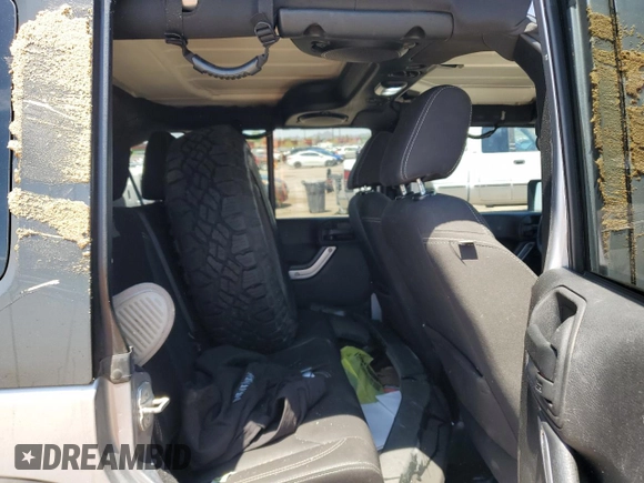 2014 Jeep Wrangler Unlimited Rubicon with VIN 1C4HJWFG1EL241014, listed as a Copart auction lot 63948655 with 165,650 mi miles and Salvage title. Bid and sale history available at DreamBid. Image 10.