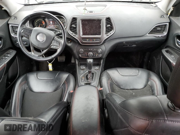 2021 Jeep Cherokee Trailhawk with VIN 1C4PJMBX2MD143446, listed as a Copart auction lot 55166945 with 83,841 mi miles and Salvage title. Bid and sale history available at DreamBid. Image 8.