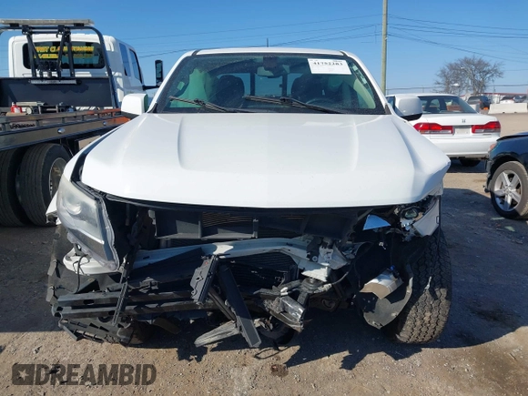 2019 Chevrolet Colorado 4WD Z71 z VIN 1GCGTDEN9K1135489, wystawiony jako IAAI lot #41752283 z przebiegiem 180 854 mil mil oraz . Historia ofert i sprzedaży dostępna na DreamBid. Obrazek 12.